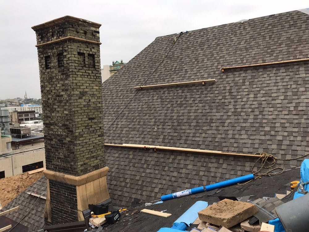 damaged roof repair Oconomowoc, WI