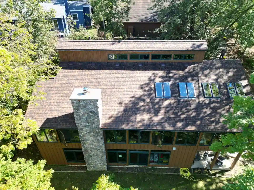 Finished roof replacement with high-quality shingles installed