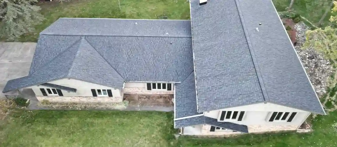 Completed roof replacement project in Wisconsin showing shingle installation after service