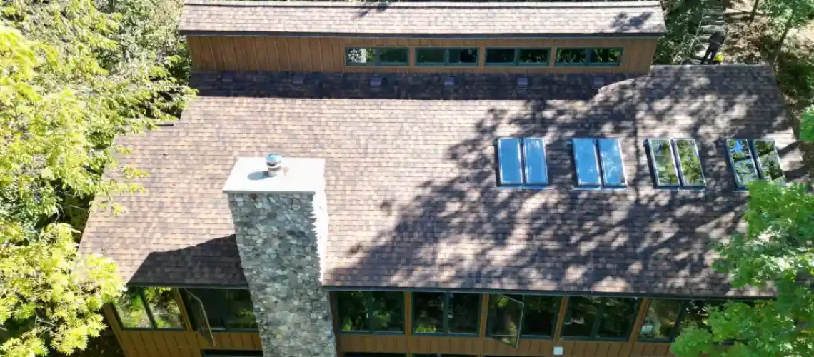 Finished roof replacement with high-quality shingles installed